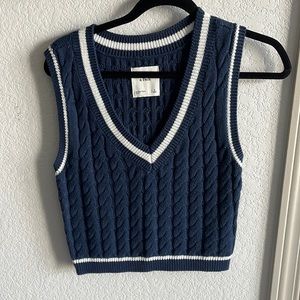 Blue and white sweater vest